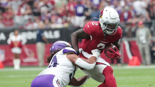 Arizona Cardinals running back Chase Edmonds (2) is tackled by Minnesota Vikings middle linebacker Eric Kendricks (54) during the first quarter in Glendale, Ariz. Sept. 19, 2021.

Cardinals Vs Vikings
